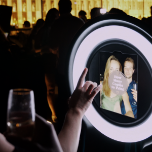 Customers using a photo booth rental